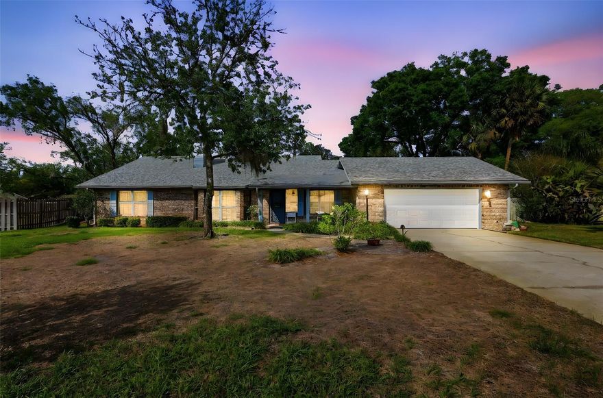 There is something special about a brick home that just feels right—warm, grounded, and built to last. Just minutes from downtown DeLand, this home offers the perfect balance of quiet living and convenience.

Set in an established neighborhood with mature trees, this home offers the kind of setting people are actively looking for—quiet streets, shade, and a sense of place that newer areas often lack.

Inside, you will find a spacious layout with large, comfortable rooms that make everyday living easy. The expansive Florida room is the true centerpiece—filled with natural light and offering endless possibilities for relaxing, entertaining, or simply enjoying the view of your backyard.

Step outside and you will appreciate the large yard, giving you room to spread out, garden, entertain, or just enjoy a little extra space around you.  DeLand is known for its charming, award-winning Main Street, local shops, restaurants, and year-round events, as well as the beautiful campus of Stetson University.

Nearby, you will find parks, walking trails, and easy access to major roads for commuting, while still enjoying the peaceful feel of a more established residential setting. It is the best of both worlds—close to everything, yet tucked away just enough to feel like home.

If you are looking for a home with character, space, and a welcoming, homey feel in a well-established setting, this one checks all the boxes.