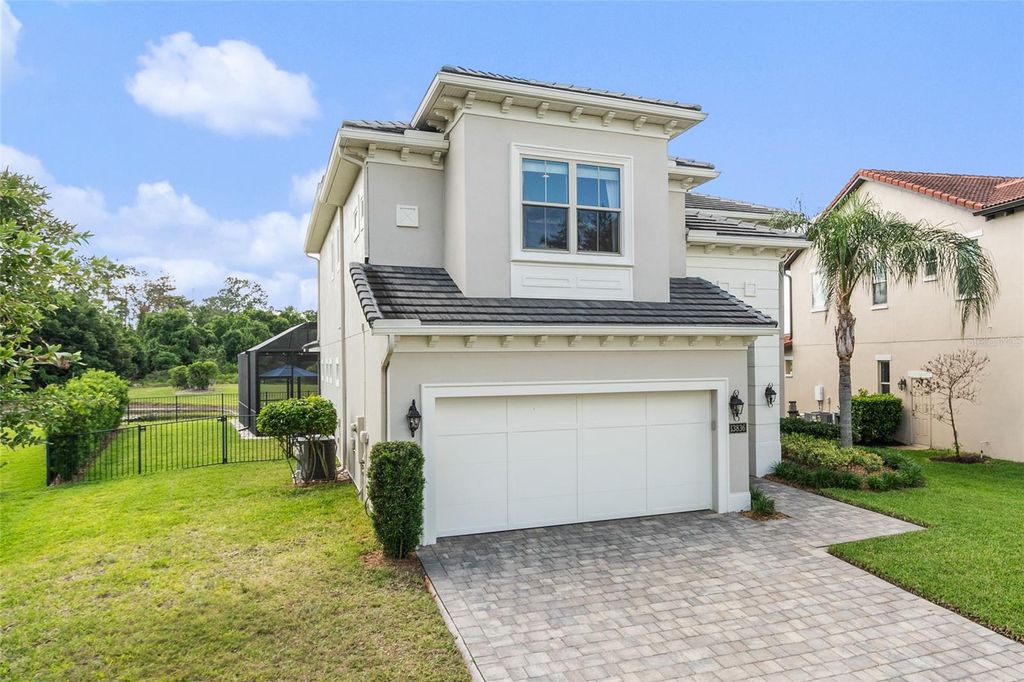 Photo of 13836 Budworth Circle, Orlando, FL 32832 (MLS # O6404711)