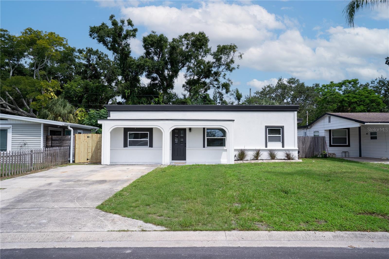You must see this beautifully updated 3 bedroom, 2 bathroom single-family home in the heart of St. Petersburg. It features fresh interior and exterior paint, new LVP flooring, modern lighting, and a stunning new kitchen with stainless steel appliances, recessed lighting, a spacious peninsula, and abundant cabinets and counter space. The large primary suite offers a private en-suite bathroom with walk-in-shower, while the updated guest bath and inside laundry add convenience and style. Centrally located near parks, beaches, shopping, dining, and entertainment, this move-in-ready home has it all—schedule your showing today before it’s gone!