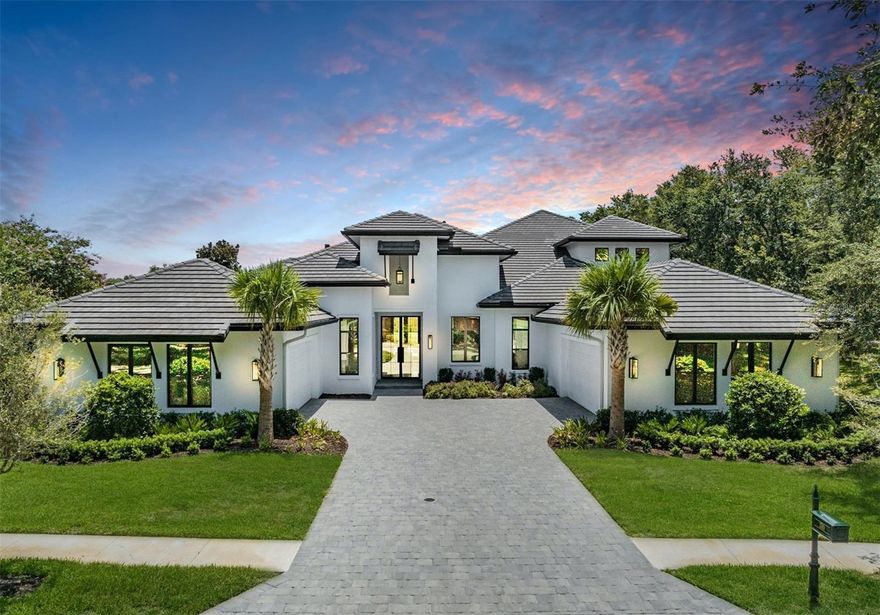 A STUNNING Masterpiece, Completed in 2022! Designed and Constructed with Luxury & Sophistication, this Arthur Rutenberg Home Located in Palm Harbor’s Most Exclusive Resort Style Community, will Surely Impress. Behind the 24 Hour Manned Gates, Perfectly Situated on a Private Culdesac, Overlooking the Golf Course & Conservation, you Will Find 5449 Square Feet of True Elegance and Beauty throughout the 5 Bedroom, 5 Full Bathroom, 2 Half Bath, Gym, Office/Media Room, Loft & 4 Car Garage.  Excellent Curb Appeal from the Tree-Lined Streets in this Exquisite Neighborhood. The Pavered Oversize Driveway leads to Breathtaking 10 Ft Full-Glass French Front Doors, Inviting you into the Showcase Home. A Perfectly Appointed Foyer Leads to the Spacious, Open Concept Living Space, Featuring A Floor-to-Ceiling Granite Fireplace, A Wall of Glass French Doors that Disburse Natural Light Throughout, a Chefs Dream Kitchen, Formal & Informal Dining Areas, and Beautiful Views of the Pool and Golf Course. The Formal Dining Area Flows Into the State-of-the-Art Kitchen, Complete with Floor to Ceiling Custom Cabinetry, 60” Thermador 6 Burner & Large Griddle Natural Gas Range with Double Ovens, Subzero 60” Side-by-Side Refrigerator and Freezer, Beverage Center, Quartzite Countertops. Large Buffet and Walk-In Pantry with Custom Built Shelving off the Kitchen. A Beautiful Foyer Off the Living Area Leads to the Primary Bedroom with French Doors to the Pool, a Large Walk-In Closet, and A Spa-Like Bathroom Complete with Soaking Tub, Dual Vanities, Large Walk-In Shower, Designer Marble Countertops, and a Private Garden Space. Exquisite Laundry Rm off the Kitchen & Next to the Garage is Finished with Brazilian Carrara Marble Countertops, a Pet Wash Area, Custom Storage, and abundance of Natural Light. The Picturesque Gym Space with a Full Wall of Mirrors has a Large Picture Window Overlooking the Trees, Creating a Perfect Space for Reflection and Peace. Walking Past the Informal Dining Area, the Hallway Leads to a Bonus Room/Media Room and adjacent Full Bath, & a Beautiful Guest Suite with Private Bath, Walk-in Shower and Quartzite Countertops. The Main Floor is Finished with an Office /Guest Room Adjacent to Front Entry. Two Additional Bedrooms with Private Bathrooms and Walk-in Closets are Found Up a Stylish Wood and Wrought Iron Stairway. The Upstairs Living Area is Complete with a Large Loft, Beverage Center, Additional Half Bath and Outdoor Terrace with Sweeping Views of the Golf Course and Conservation Area. The Outdoor Area is a Place to Enjoy and Entertain, Featuring Shellock Pavers, Tongue and Groove Wood Ceilings, a Sparkling Saltwater Pool with Fountain, Gas Fire Pit, & an Outdoor Kitchen with Grill, Cabinet Space, Refrigerator & Sink. For More Entertaining Highlights - Highlands of Innisbrook is a Resort-Style Golf and Tennis Community with 4 Excellent Golf Courses, including the Famous Copperhead Course that hosts a PGA Tournament every year in March. The community also features 11+ Tennis Courts, Fitness Center, Racquetball, Spa, Great Restaurants, and 6 Heated Pools (Loch Ness Pool w/ Water Slide). Mandatory Membership Required to Innisbrook Resort. Social Memberships start at $190 a month + $190 annually. Located less than 30 minutes to some of Pinellas County’s most popular Beaches along the Gulf of Mexico and is conveniently located near A Rated schools, shopping, restaurants, County Parks, Pinellas Trail, & easy access to Tampa International Airport