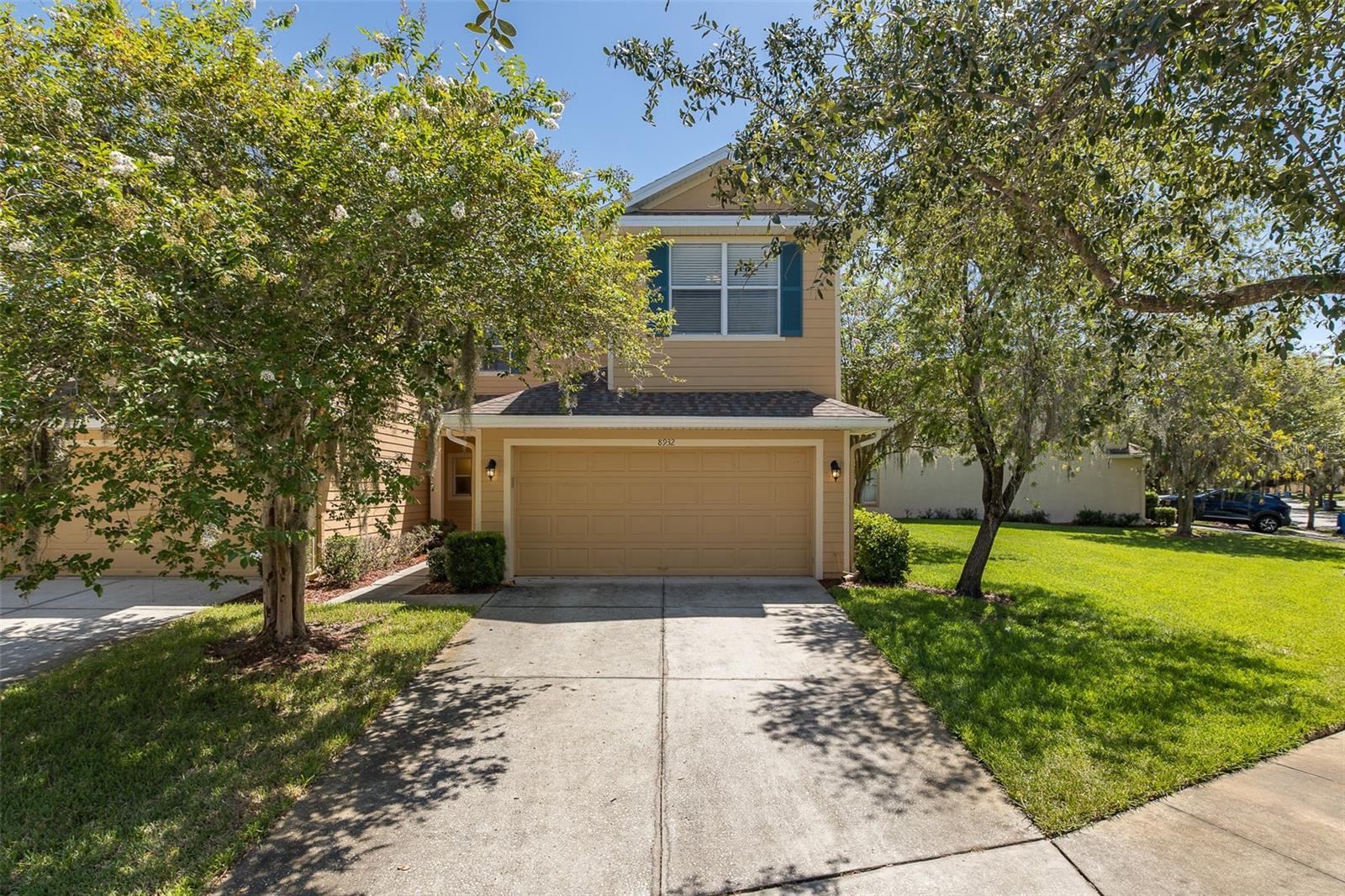 Terrific NEW TAMPA Location ~ this Move-in Ready 3 bedroom, 2.5 bathroom + 2 car garage home offers 1,455 square feet of open living space. The first floor is adorned with neutral tile flooring & you will find a spacious living room & dining room with 2 sets of sliding glass doors overlooking the sparkling pond! The kitchen is a chef's delight & is equipped with wood cabinetry & stainless steel appliances to include a brand NEW microwave! An inside laundry space & half bathroom complete the main floor. Upstairs you will find the owner's suite which boasts BRAND NEW neutral carpeting & a large walk-in closet. The en suite bath features a large custom tiled shower & double sink vanity! Bedrooms 2 & 3 are spacious & offer BRAND NEW neutral carpeting & roomy closets. The Guest bathroom features a neutral vanity & tub/shower. This amazing home has many recent updates: NEW Roof (2018), NEWER HVAC (2020), NEW Water Heater (2023), NEW Washer (2025), NEWER Dryer (2023), NEW Microwave (2025), BRAND NEW Carpeting on Staircase & All Bedrooms (2025) & SO Much More! Live Oak Preserve offers an abundance of resort-style amenities, including a guard gated entrance, community pool/spa with a splash zone, a clubhouse, fitness center, tennis and volleyball courts, and multiple playgrounds and walking paths to enjoy the outdoors. *Location* Location* Location* just minutes from I-75, top-rated schools, Wiregrass Mall, Tampa Premium Outlets, USF, Moffitt Cancer Center, Advent Health, Costco, Publix, and many restaurants and shopping options. Whether you're looking for your first home, a seasonal home, or a maintenance-free lifestyle, this move-in ready home is awaiting its new owner! Best Value in the community! Schedule your private showing today!