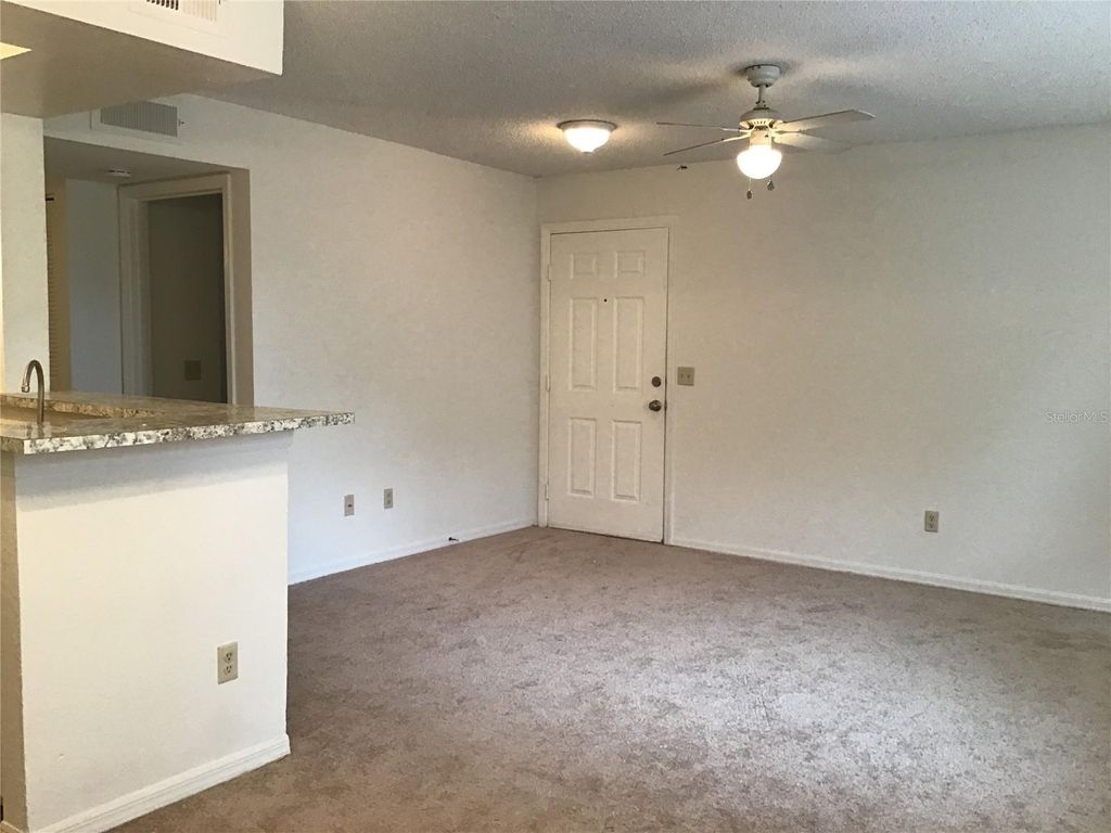 Photo of 1029 S Hiawassee Road #2412, Orlando, FL 32835 (MLS # O6403016)