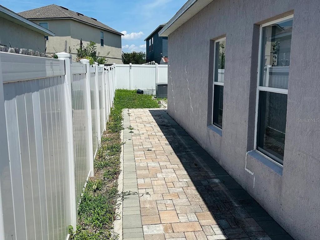 Photo of 7780 Newlan Drive, Orlando, FL 32818 (MLS # O6416449)