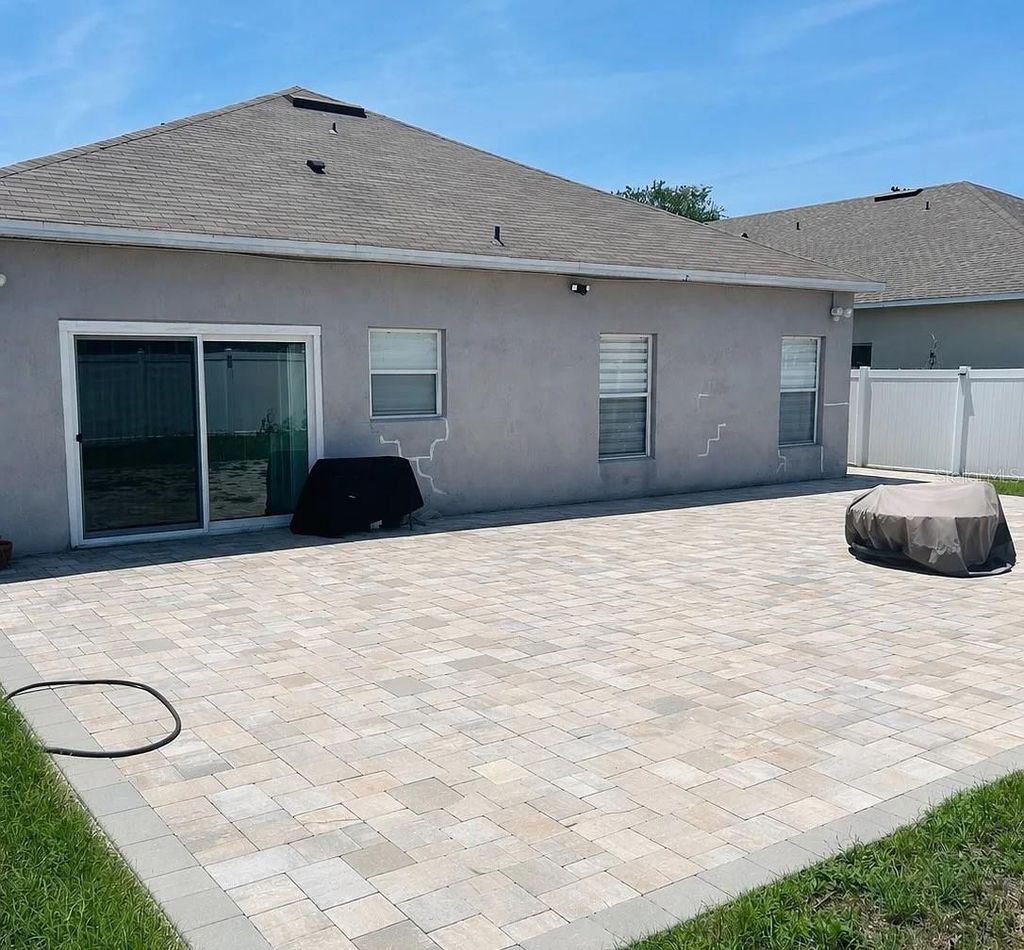Photo of 7780 Newlan Drive, Orlando, FL 32818 (MLS # O6416449)