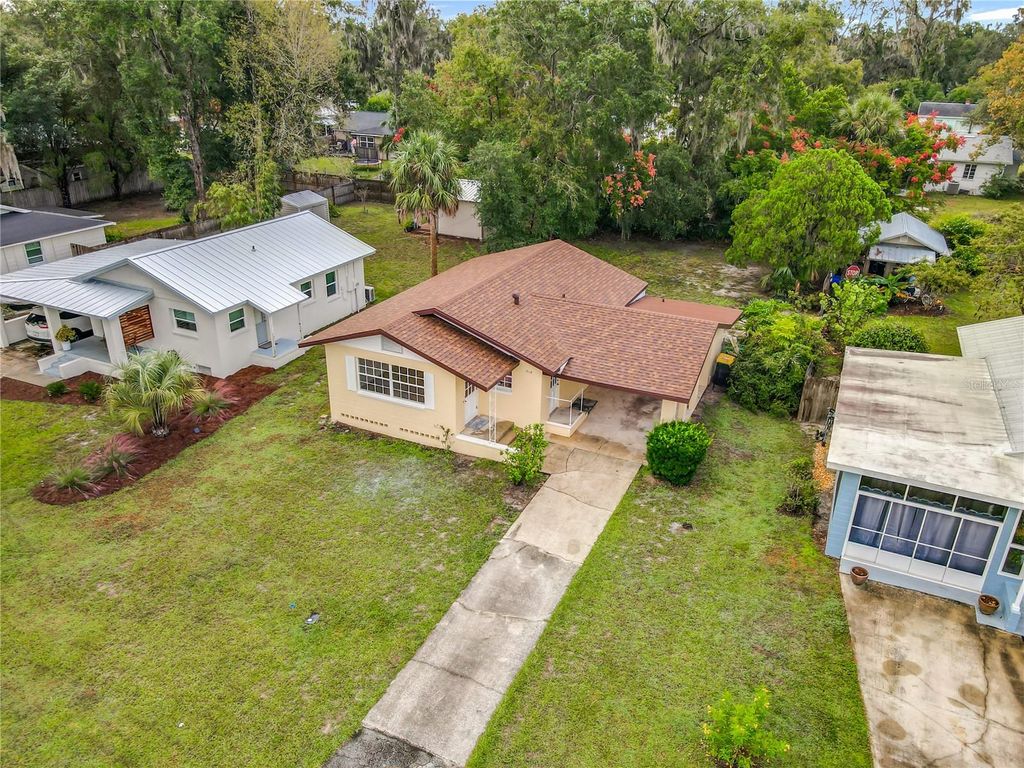 Photo of 718 W Hogle Avenue, Deland, FL 32720 (MLS # V4945457)