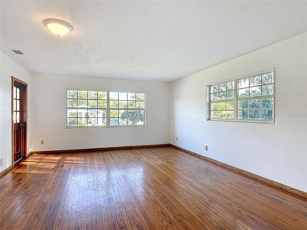 Photo of 718 W Hogle Avenue, Deland, FL 32720 (MLS # V4945457)