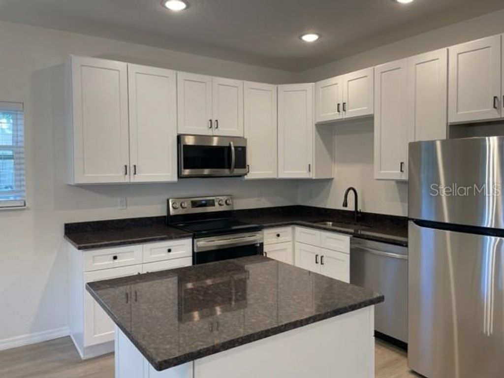 Photo of 1482 Cleveland Street, Clearwater, FL 33755 (MLS # TB8500461)