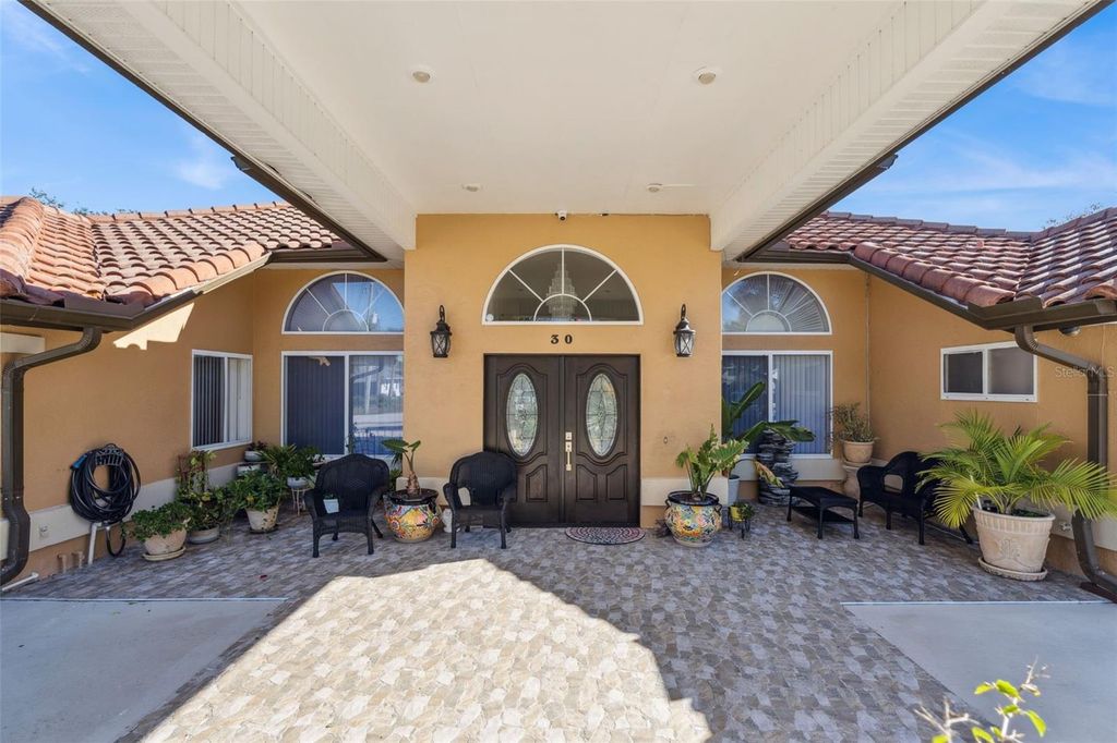 Photo of 30 Covington Lane, Palm Coast, FL 32137 (MLS # O6357783)