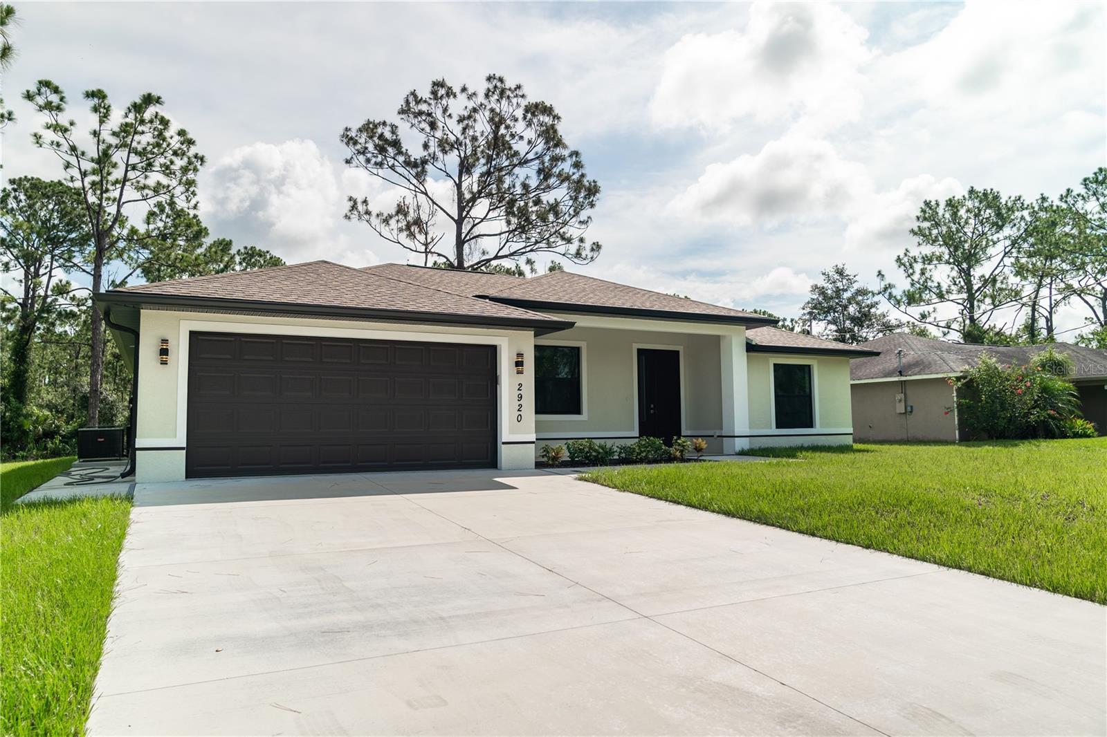Here it is!! One-of-a-Kind New Construction in North Port! Welcome to Barry Road - this brand new 3-bedroom, 2-bath masterpiece stands apart with a custom engineered floor plan to maximize space, crafted for both function and flair. Includes HURRICANE IMPACT WINDOWS throughout, sleek contemporary finishes, and a light-filled open layout that feels as fresh as it looks. Could this get any better? YES, IT CAN! Home sits on a greenbelt in your backyard, which means...MORE PRIVACY FOR YOU!! They always say location, location, location, and this home is a perfect example of it. Quick access to the I-75 ramp so you can enjoy a quick and easy commute without hearing the traffic noise. Short drive to Wellen Park, and a quick commute to the vibrant culture and beaches of Sarasota. And that's called PRIME REAL ESTATE. Don't settle for cookie-cutter: Own something truly unique and brand new.