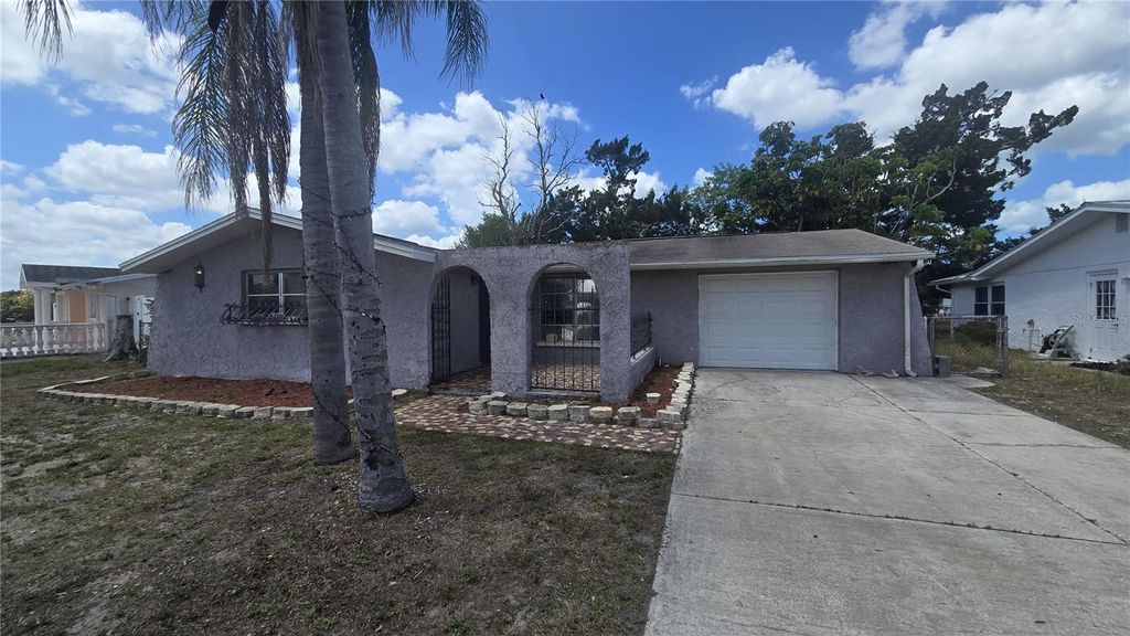 Photo of 9401 Glen Moor Lane, Port Richey, FL 34668 (MLS # TB8495117)