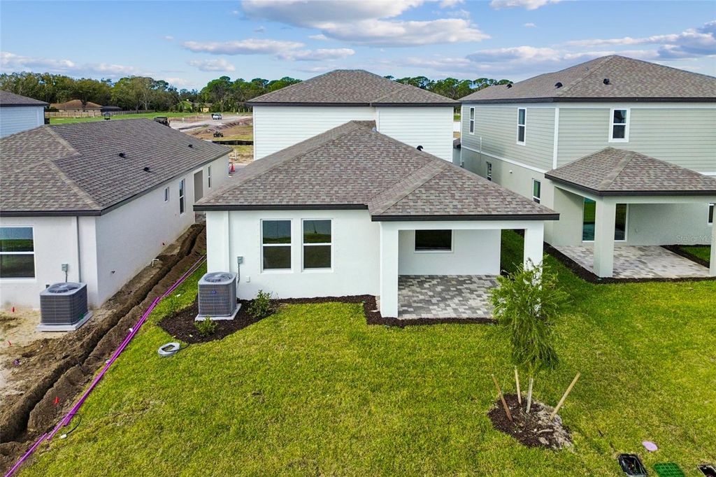 Photo of 9102 Optimist Way, Palmetto, FL 34221 (MLS # R4910325)