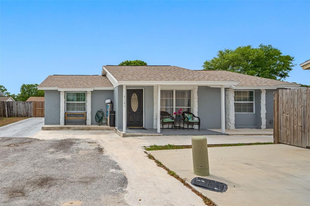 Photo of 9127 Sandcroft Court, Tampa, FL 33615 (MLS # TB8457420)