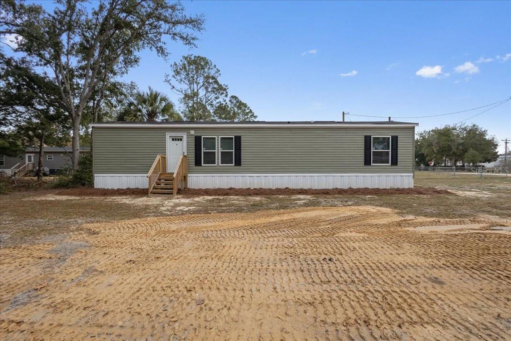 Photo of 1231 NW 11th Drive, Chiefland, FL 32626 (MLS # GC535949)