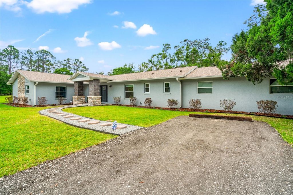 Photo of 28628 Bennington Drive, Wesley Chapel, FL 33544 (MLS # TB8369963)