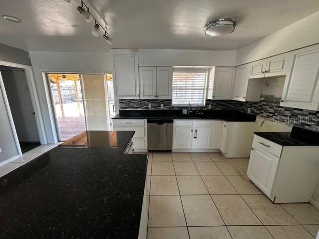 Photo of 7413 Sherren Drive, Tampa, FL 33619 (MLS # TB8479696)