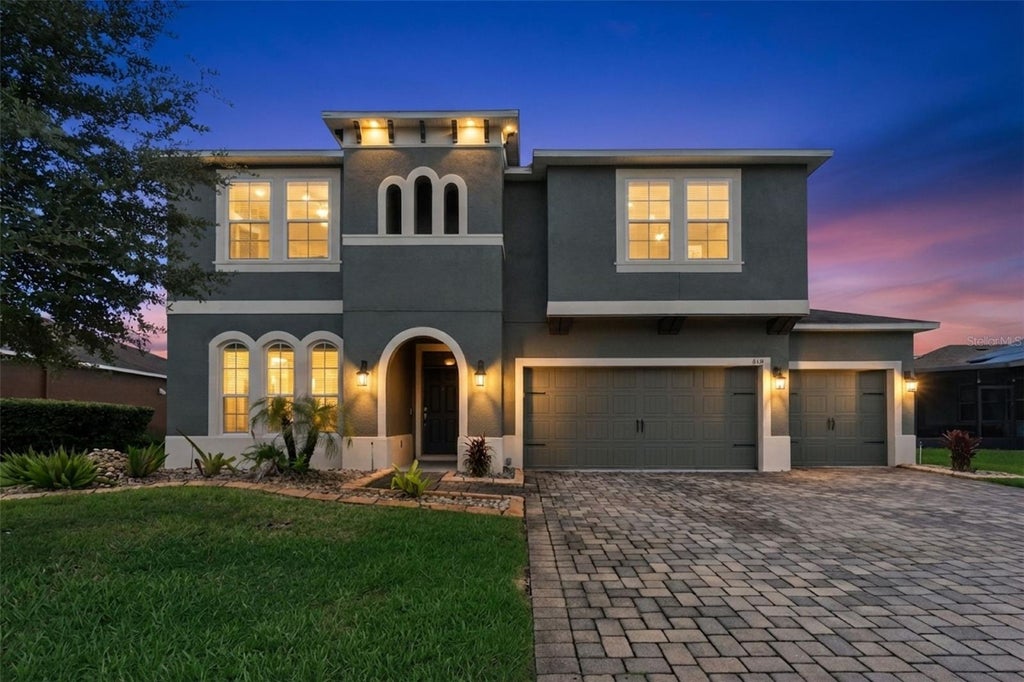Photo of 310 Brunswick Drive, Davenport, FL 33837 (MLS # O6438364)