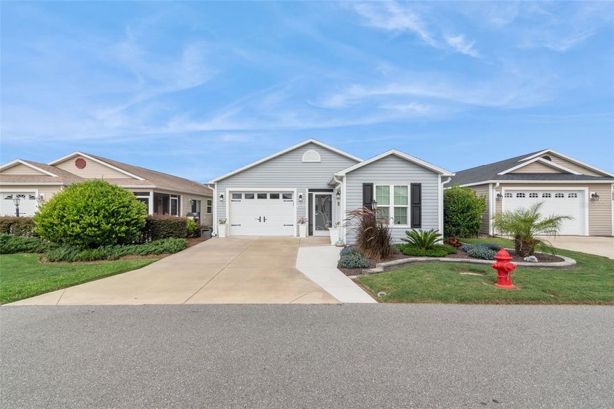Welcome to this adorable 3-bedroom, 2-bathroom home located in the highly desirable community of The Villages. Step inside and be greeted by a bright, open floor plan that seamlessly connects the living area, kitchen including a gas range, and dinette—perfect for everyday living or entertaining. The primary bedroom features a spacious walk-in closet and an ensuite bathroom with a vanity and standalone shower. Two comfortable guest bedrooms and a guest bathroom with a tub/shower combo provide plenty of space for family or visitors. Additional conveniences include a laundry closet, a 1-car garage, and a golf cart garage—offering ample storage and flexibility.

Step outside to enjoy your side patio with an awning, a wonderful spot for morning coffee or relaxing evenings while taking in Florida’s warm breezes.

Located within the Village of Fenney in Longleaf Villas, this home sits in a beautiful neighborhood surrounded by mature trees, scenic nature trails, and abundant amenities. You’ll be just moments from the Regional Recreation Center, resort-style pool, and the popular Fenney Grill. Residents can take advantage of an active lifestyle with access to golf, pickleball, putt-putt, water volleyball, water aerobics, and more!

With easy access to Highway 301, the Florida Turnpike, Route 44, and I-75, you’re conveniently connected to Tampa, Orlando, Ocala, and beyond. Experience The Villages lifestyle—where comfort, community, and recreation come together perfectly!