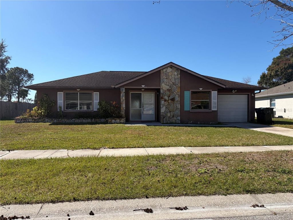 Photo of 12570 Indiana Woods Lane, Orlando, FL 32824 (MLS # O6377186)