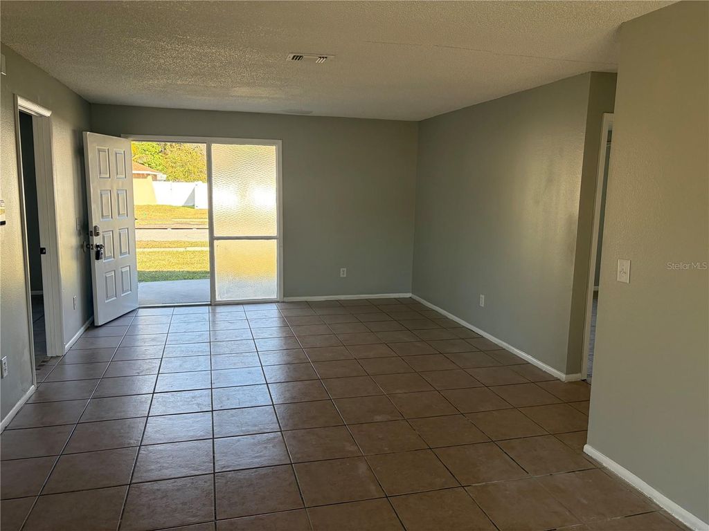 Photo of 12570 Indiana Woods Lane, Orlando, FL 32824 (MLS # O6377186)