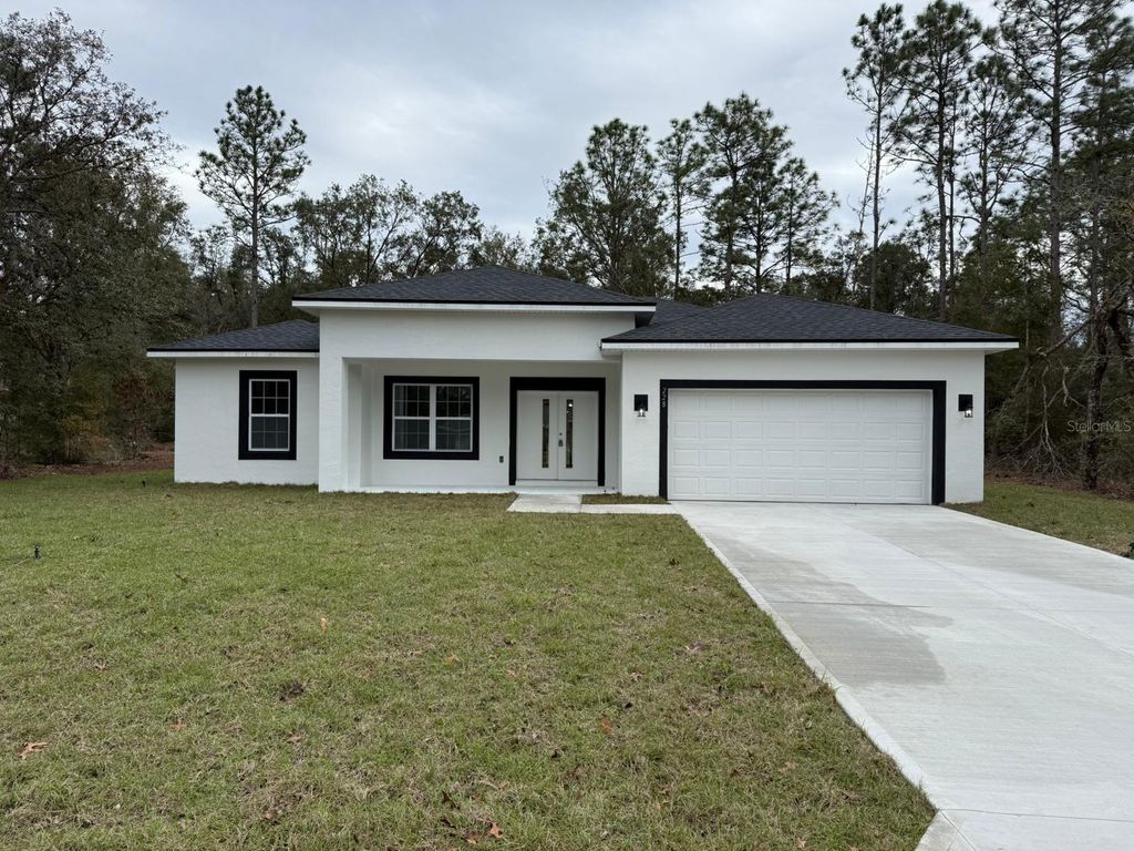 Photo of 228 W Brimson Place, Citrus Springs, FL 34434 (MLS # O6377120)