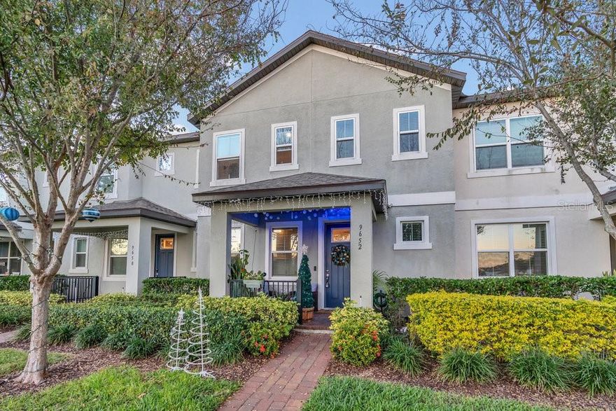 Beautifully updated 4-bedroom, 2.5-bath townhome in the highly desirable Waterleigh / Horizon West area of Winter Garden. This move-in-ready home features a bright, open floor plan with modern tile flooring and abundant natural light throughout the main level.

The spacious kitchen offers granite countertops, sleek dark cabinetry, a large island with seating, and stainless steel appliances—including a smart refrigerator. The dining and living areas flow seamlessly, highlighted by a custom wood accent wall that creates a stylish, contemporary feel.

A rare first-floor bedroom provides the perfect space for guests or a home office. Upstairs, you'll find three additional bedrooms with upgraded wood-look flooring and generous closet space. The private primary suite features a tray ceiling, modern finishes, and an en-suite bathroom with dual sinks and a large walk-in shower.

Enjoy your own private outdoor patio, complete with pavers, a vertical garden wall, and plenty of room for grilling, dining, or relaxing.

Key Features:
• Move-in-ready and beautifully maintained
• First-floor bedroom
• Granite counters + stainless steel appliances
• Upgraded flooring throughout
• Private, fully finished patio space
• Covered front porch with charming curb appeal
• Resort-style community amenities: pools, clubhouse, fitness center, walking trails, dog parks & more

Located just minutes from Hamlin Town Center, top-rated schools, restaurants, shopping, and major highways, this home offers unbeatable convenience in one of Winter Garden’s fastest-growing communities.

Don’t miss this opportunity—homes like this in Waterleigh go fast!