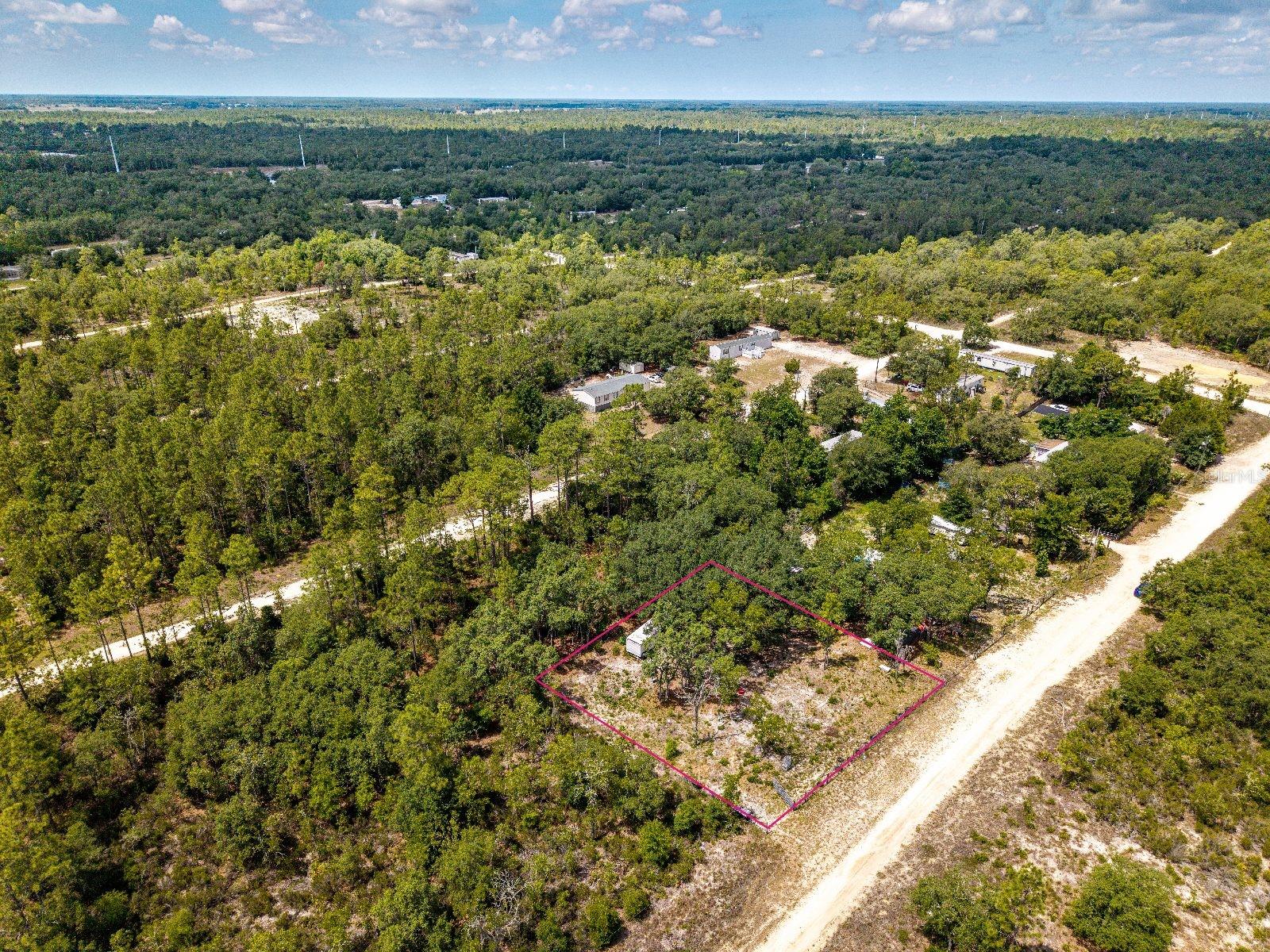 Vacant Land with Camper – 0.24 Acres – NE 65th St, Williston, FL 32696
Buildable 0.24-acre residential lot located on a quiet, unpaved road in Williston, FL. The property is fully fenced with 162.02 ft of road frontage and power available at the road. Mobile homes are allowed, making this a versatile and affordable option for future development or investment.
Includes a 26-ft camper featuring:
1 bedroom / 1 bathroom;
Queen-size bed;
Two bunk beds (sleeps 2);
Flat, usable land with easy access;
No HOA or deed restrictions;
Zoned for residential use.
Located in a peaceful rural setting, yet just 30 minutes from Gainesville and near natural springs, trails and local amenities. Great potential for full-time living, rental use or long-term investment. ALL INFORMATION FROM THE SELLER AND MUST BE VERIFIED BY THE BUYER!