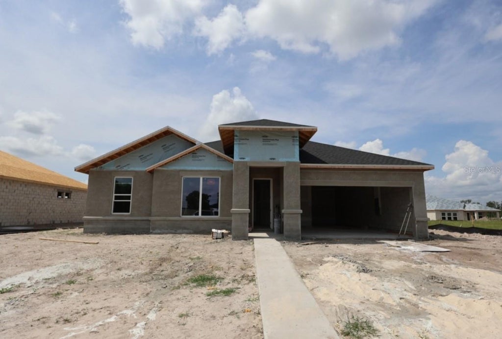 Photo of 437 Spring Harvest Drive, Plant City, FL 33566 (MLS # TB8509236)