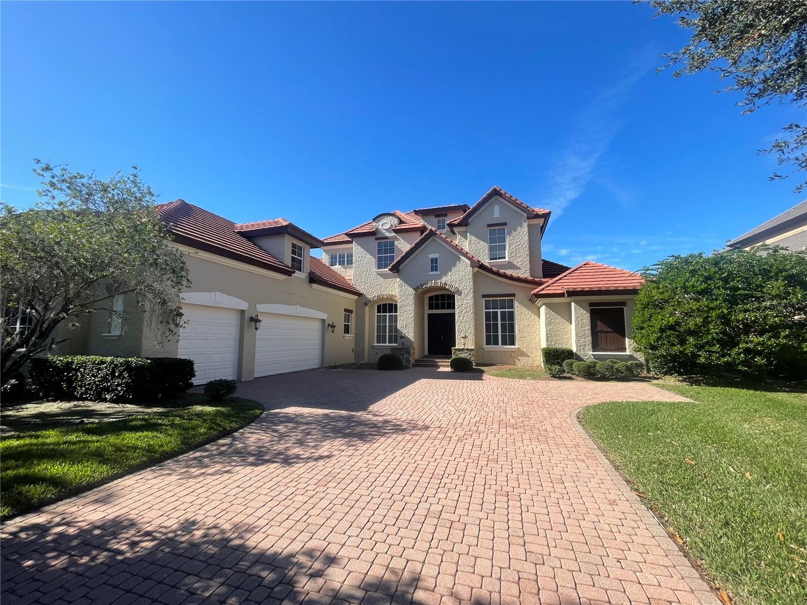 Keene's Pointe, gated/24-hour attended community in desirable Windermere, Florida. This custom home with original owner features 5 bedrooms, 6.5 baths with an office den, formal living/dining rooms, and two bedrooms on the first floor (primary and guest ensuite). The second floor features a bonus room perfect as a media room, home gym or additional bedroom, three bedrooms and a spacious bonus/game room. The oversized screened pool and view of the golf course is perfect for entertaining. A three-car garage completes this home. Located in close proximity to shopping, dining, top-rated public and private schools, expressways and tourist attractions.
