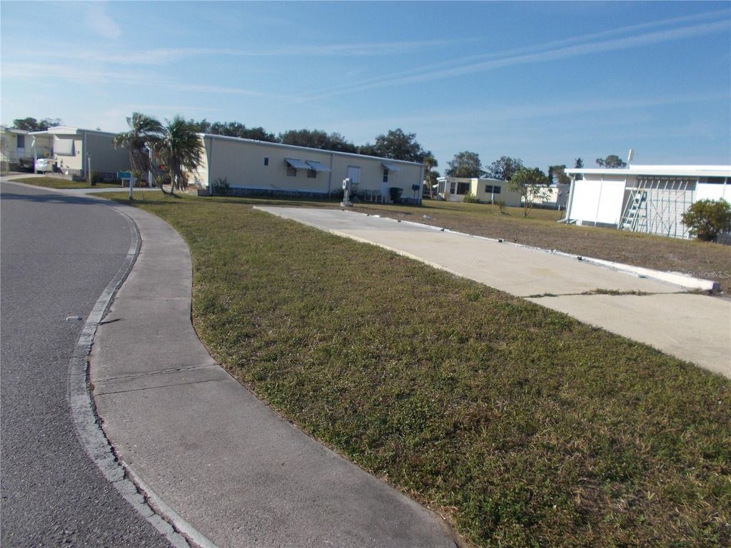 Photo of 6581 Center Lane, North Port, FL 34287 (MLS # C7475651)