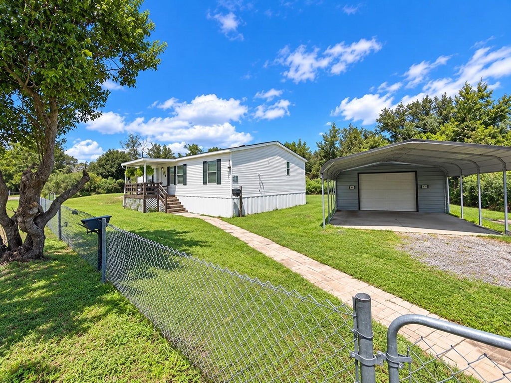 Photo of 9027 Hammock Loop, Polk City, FL 33868 (MLS # TB8546418)