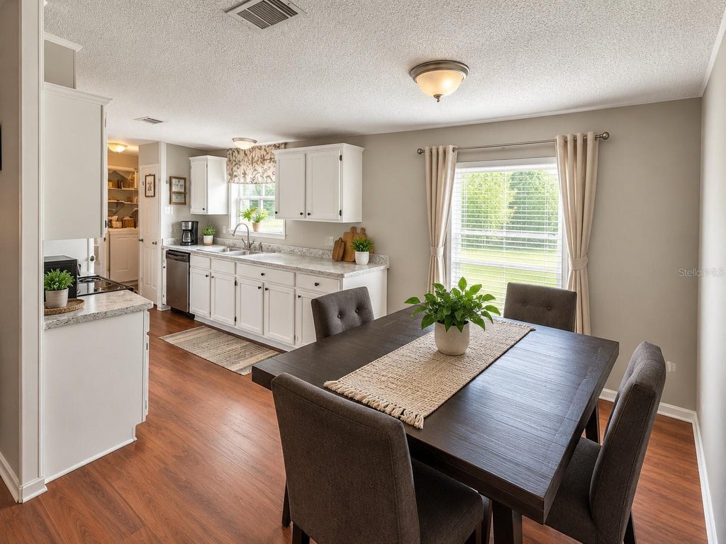 Photo of 9027 Hammock Loop, Polk City, FL 33868 (MLS # TB8546418)