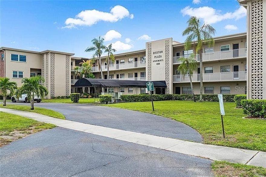 Welcome to this delightful 1-bedroom, 1-bath with bonus room condo nestled in the heart of St. Pete! It is centrally located and close to everything you need - vibrant downtown, restaurants, shopping and the beautiful beaches. Enter inside to a bright and airy open-concept living space featuring laminate floors, fresh natural paint, and abundant natural light. The spacious living room flows seamlessly into the dining area, ideal for entertaining. The bedroom is a serene retreat with an en-suite bathroom that includes a bathtub and shower. The bonus room/den can be used as a second bedroom, office or your favorite reading spot. With the HOA fee covering water, sewer, trash, and exterior maintenance, plus an assigned parking space and ample guest parking, this condo is as practical as it is charming.