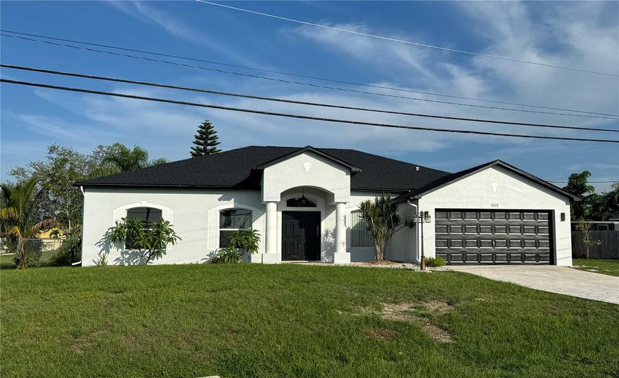 This stunning single-family home in Cape Coral offers 3 spacious bedrooms plus a versatile den/office and 2 bathrooms, perfect for families or those who work from home. Enjoy peace of mind with a brand-new roof and A/C system installed in June 2024. Step into the completely renovated kitchen featuring elegant quartz countertops, all-new stainless steel appliances, and a large eat-in island—ideal for cooking and entertaining. The master suite is a true retreat, featuring a walk-in closet, a luxurious soaking tub, a separate newly updated shower, and dual vanity sinks with matching quartz surfaces. Situated on a triple lot, this property boasts a spacious fenced-in yard and a screened lanai, offering plenty of outdoor space for relaxation, pets, or future additions. Don’t miss out on this move-in-ready gem that blends comfort, style, and space—all in a prime Cape Coral location!