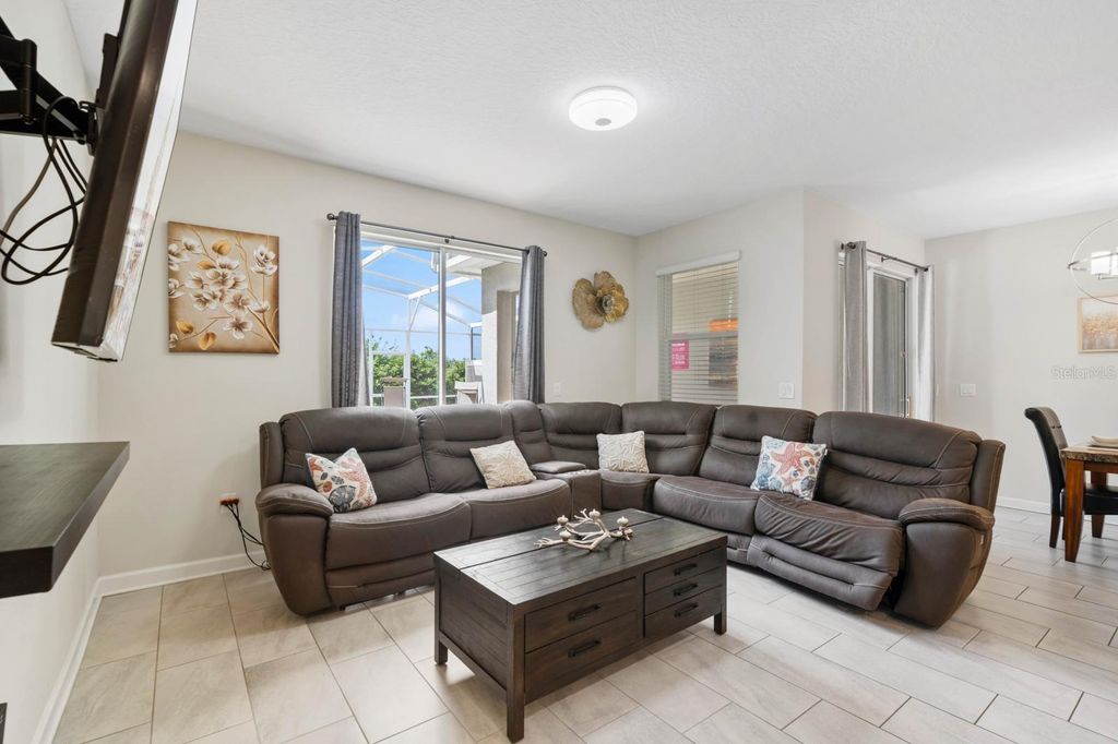 Photo of 900 Pebble Beach Drive, Davenport, FL 33896 (MLS # S5135371)