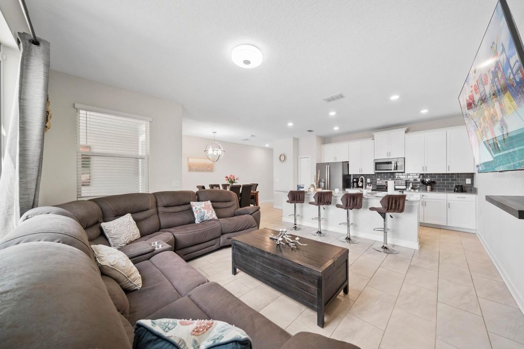 Photo of 900 Pebble Beach Drive, Davenport, FL 33896 (MLS # S5135371)