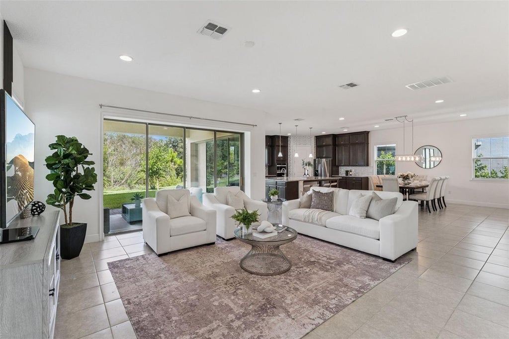 Photo of 13169 Bromborough Drive, Orlando, FL 32832 (MLS # O6448130)