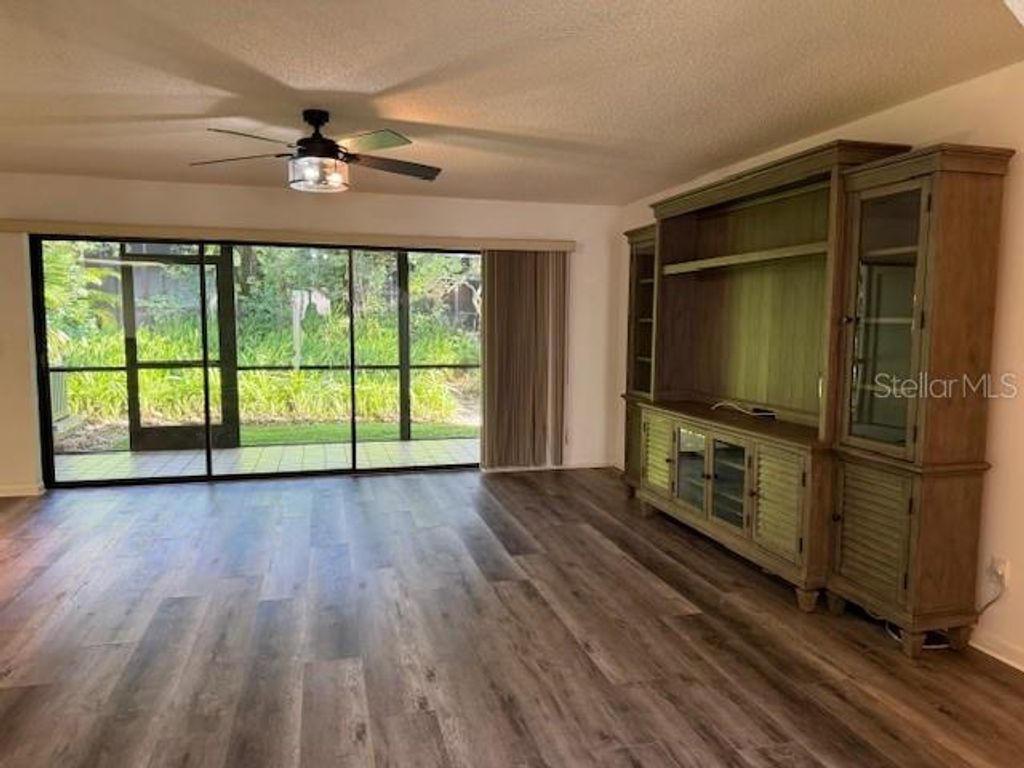Photo of 1913 Whispering Way, Tarpon Springs, FL 34689 (MLS # W7884933)