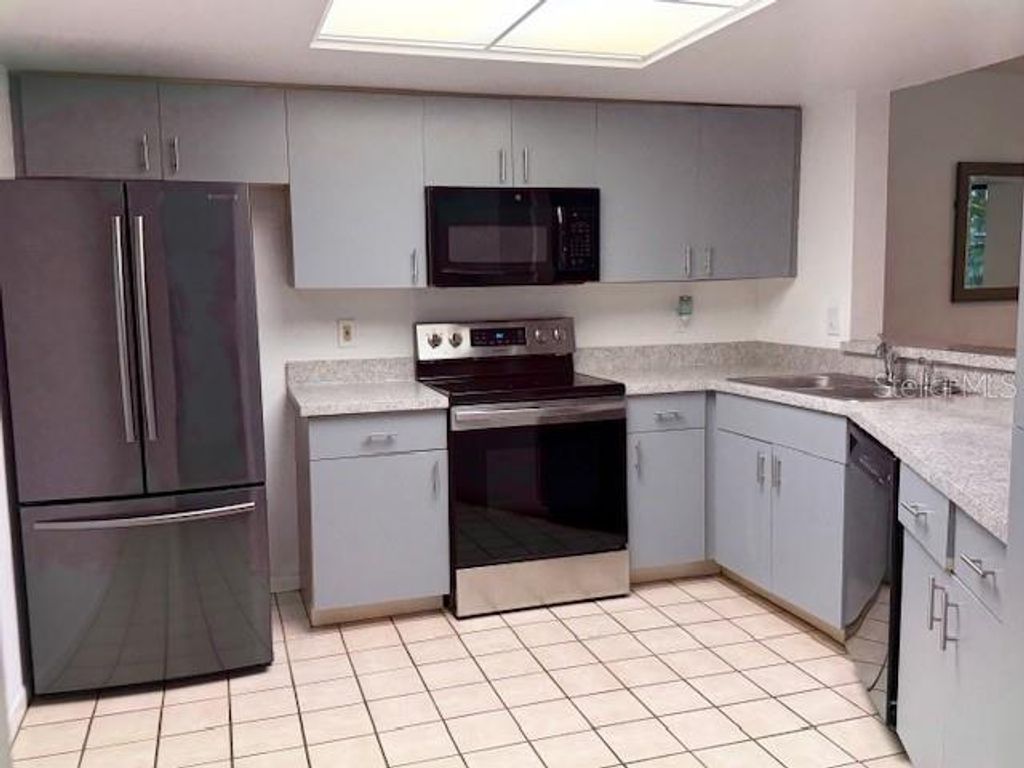 Photo of 1913 Whispering Way, Tarpon Springs, FL 34689 (MLS # W7884933)