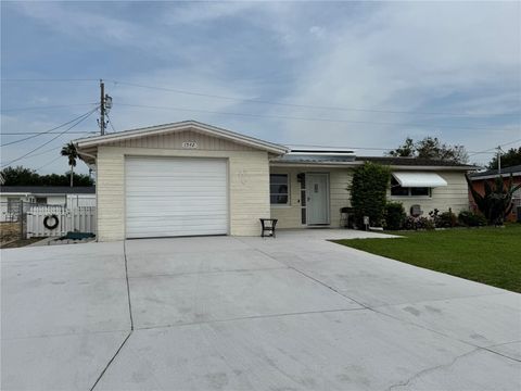 Photo of 1542 Derrick Street, Holiday, FL 34690 (MLS # TB8384097)