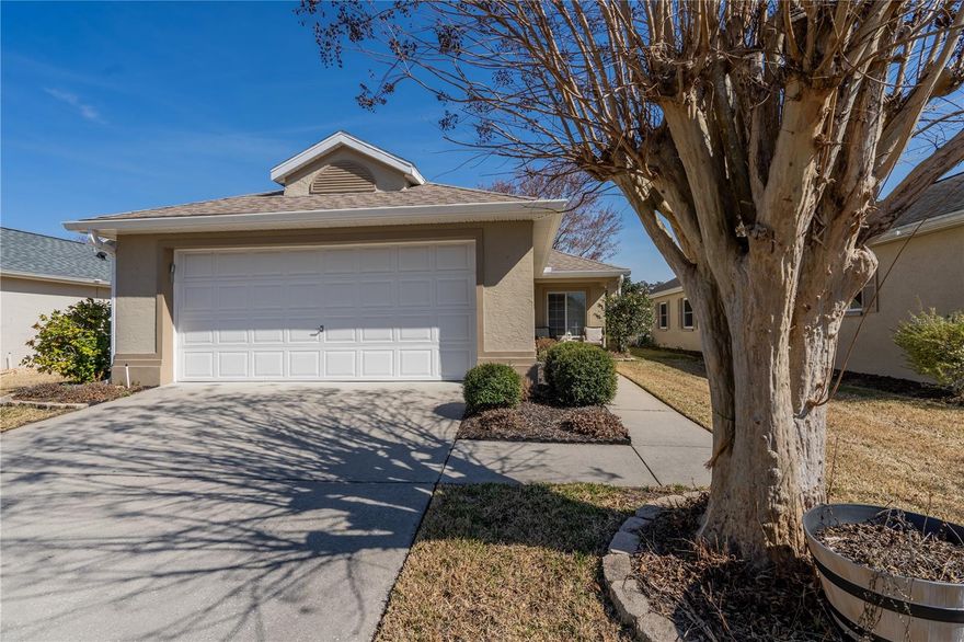 This incredibly well cared for 1182 square foot home is just STUNNING.  A couple of small tweaks to the builders floor plans makes all the difference.   This is a 2 bedroom 2 bath home but one of those tweaks has created a beautiful home with 2 en suites!   This showpiece  is located in the premier 55+ active adult golf community of Ocala Palms, a guard gated community that offers an exceptional lifestyle for it's discerning residents. Nestled in NW Ocala, the homeowners in this well established community enjoy fabulous amenities, you will never be bored in Ocala Palms with the aerobics, floor and water, arts, crafts, billiards, bingo, bowling leagues, book clubs, chess clubs, karaoke, line dancing, pickleball and way too much more to mention.  More than enough ensuring that you will always have something to do. This must see home is a split plan with an inviting dining and living room combo that is sure to please.  The comfortable and easy to cook in kitchen leads to the dining and cozy living room area.  The primary ensuite has a large walk in closet, and direct access bonus seating area. The second en suite is incredibly spacious for a second bedroom with a built in closet.    If you are looking for a 2/2 with a 2 car garage this one will check all the boxes.