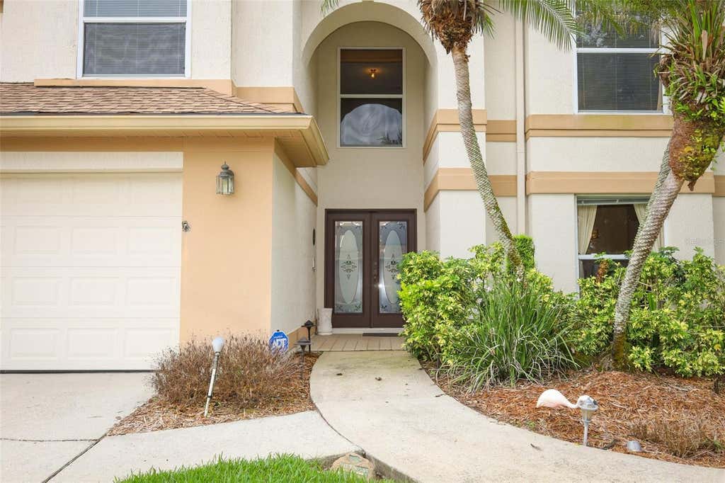 Photo of 12879 Waterhaven Circle, Orlando, FL 32828 (MLS # O6431145)