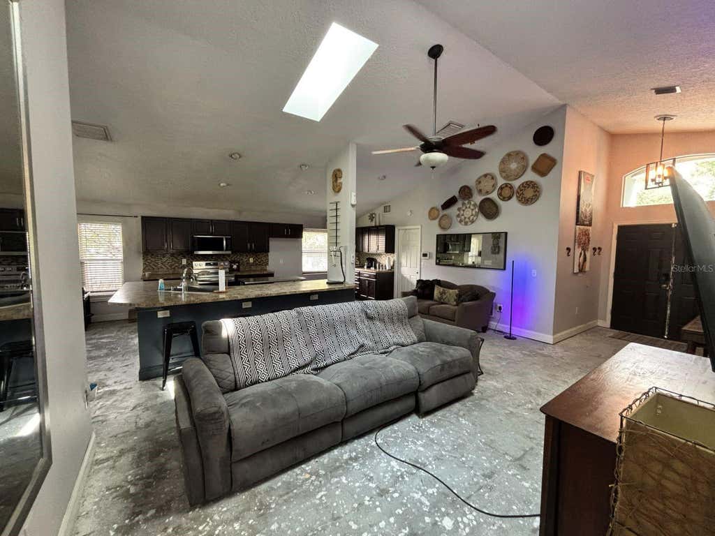 Photo of 6473 Long Breeze Road, Orlando, FL 32810 (MLS # O6433378)