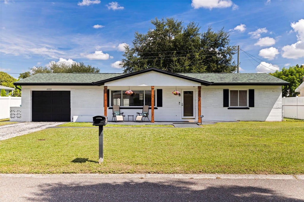 Photo of 4333 61st Lane N, Kenneth City, FL 33709 (MLS # TB8553017)