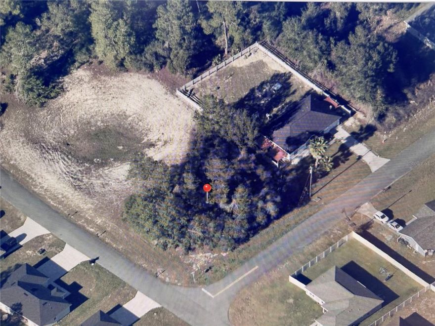 Beautiful, buildable , oversized lot on paved road in Marion Oaks. Close to shopping, restaurants, I75. Builder recommendations available.