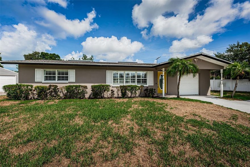 Showstopper Alert! This immaculate, move-in ready 2-bedroom, 2-bath home is tucked away at the end of a quiet cul-de-sac on an oversized five-sided lot, offering exceptional privacy, space, and versatility in a prime location on the Clearwater/Largo border.

Meticulously maintained and loaded with upgrades, this home features a newer roof, newer A/C, newer water heater, double-pane windows, and beautiful ceramic tile flooring throughout for easy maintenance and timeless style. Inside, you’ll find elegant plantation shutters and crown molding throughout, creating a warm and polished feel in every room. The home is exceptionally clean and truly move-in ready.

The thoughtfully designed layout includes a bright enclosed back porch for year-round enjoyment, plus an additional open porch, perfect for relaxing, entertaining, or enjoying Florida’s beautiful weather.

Outside is where this property truly shines. In addition to the attached one-car garage, the property offers two oversized storage structures. One shed is ideal for storing landscaping tools and equipment, while the second is the size of a full-size garage/workshop, perfect for hobbyists, extra storage, a boat, jet skis, or creating your dream workspace.

Being sold fully furnished, this property offers incredible convenience for first-time homebuyers, seasonal residents, or anyone looking to downsize without sacrificing comfort or functionality.

Located outside of a flood zone and just minutes from award-winning Gulf beaches, shopping, dining, major airports, and everyday conveniences, this home offers the perfect blend of location, value, and versatility.

Whether you're searching for your first home, a low-maintenance Florida retreat, or the ideal downsizing opportunity, this exceptional property checks all the boxes.