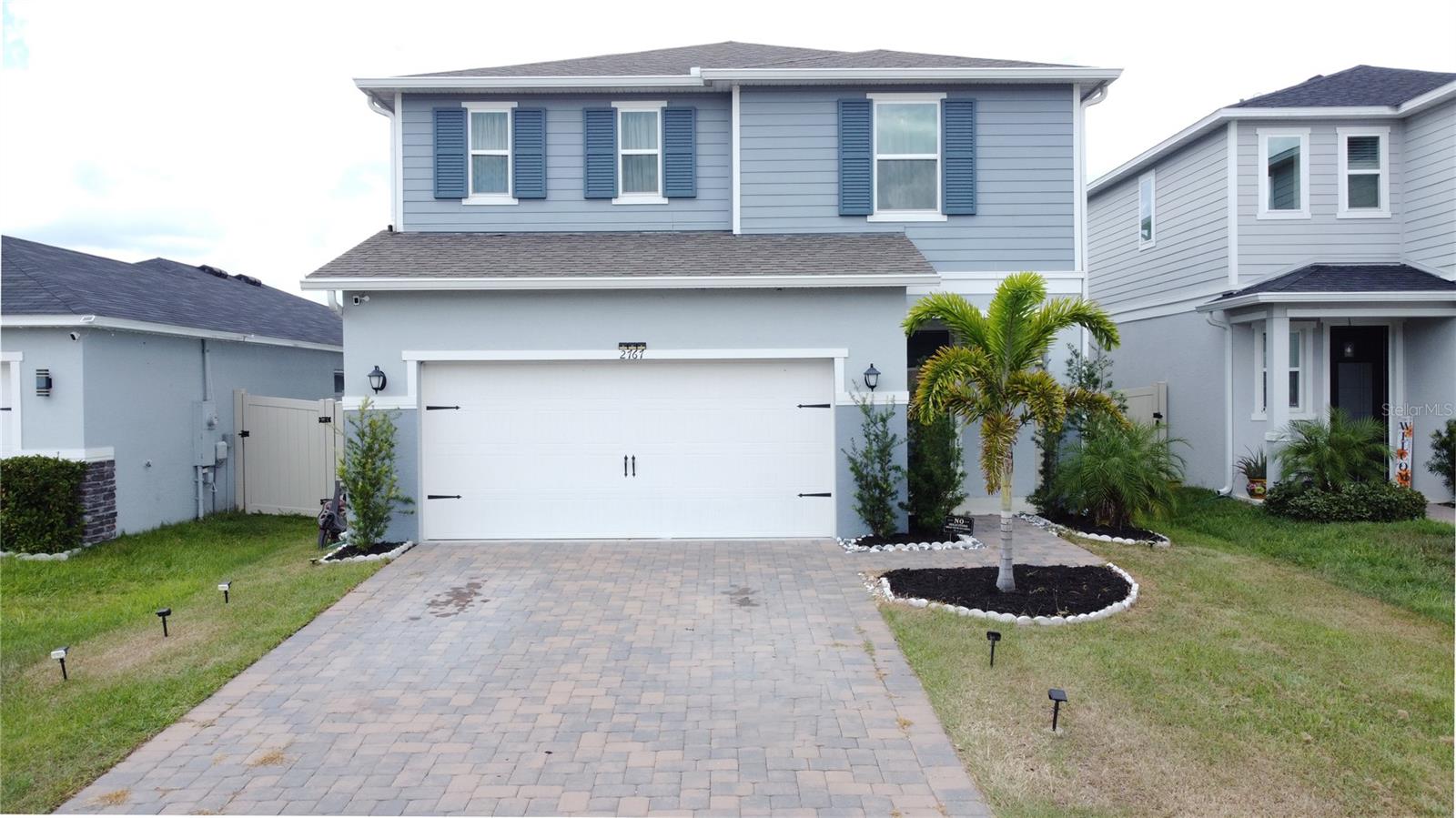 Welcome Clermont’s highly desirable neighborhood of "The Sanctuary"! This 4-bed, 3-bath, 2,187 sq. ft. home blends modern luxury with smart technology, featuring pre-wired Power-over-Ethernet for 3 security cameras, Z-Wave/Wi-Fi hands-free lighting in the living room and kitchen, and in-wall TV wire concealment in the living room and master bedroom. Enjoy a gourmet kitchen with 42” cabinets, granite countertops, and stainless steel appliances, plus a whole-house water softener. The open-concept layout boasts high ceilings, a luxurious master suite with dual sinks and soaking tub, and energy-efficient features. Relax anytime in your backyard sanctuary with 6' Vinyl privacy fence. Community amenities include a clubhouse, pool, fitness center, and playground, all near US-27, SR-429, Clermont Landing, and Lake Louisa State Park. Move-in ready, this home offers style, tech, and prime location. Make your appointment today for your private showing before this home goes under contract!