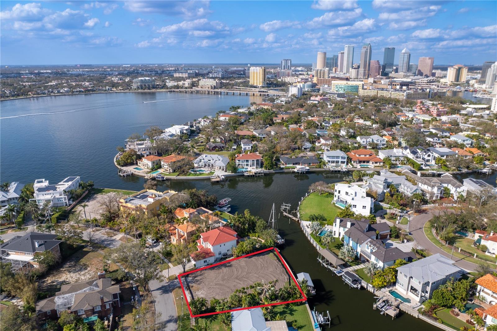 Don’t miss this rare chance to build your dream home on an expansive 104x141 Davis Islands Canal lot, located on one of the most desirable streets, Bahama Circle. Offering exceptional potential, this oversized lot provides the perfect foundation for your custom dream home, all while embracing the serene island lifestyle.
Key Features:
Prime Canal Lot: Enjoy direct water access, perfect for boating, kayaking, or simply relaxing by the water.
Desirable Location: Situated on the coveted Bahama Circle, this property is just minutes from Davis Islands Village, offering a selection of charming restaurants, lively bars, and local boutiques.
Island Lifestyle: Beyond the vibrant village, indulge in a variety of community amenities, including public tennis courts, two dog parks, a private beach, public marina, and even a private airport.
Top-Rated Schools: Located within the A+ rated school district, with access to Gorrie Elementary, Wilson Middle School, and Plant High School.
Convenient Access: Only minutes away from Hyde Park, Downtown Tampa, Tampa General Hospital, Water Street, and Sparkman Wharf, placing you at the heart of the city’s best dining, shopping, and entertainment options.
This is your opportunity to secure a prime lot on Davis Islands, where you can design and build the perfect home to match the luxurious lifestyle of this sought-after neighborhood. Live the Davis Islands dream today- schedule a tour and explore all that this incredible property has to offer!