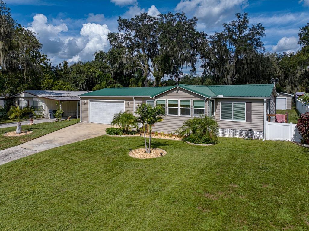 Photo of 4943 Rollinglen Loop E, Lakeland, FL 33810 (MLS # L4940335)