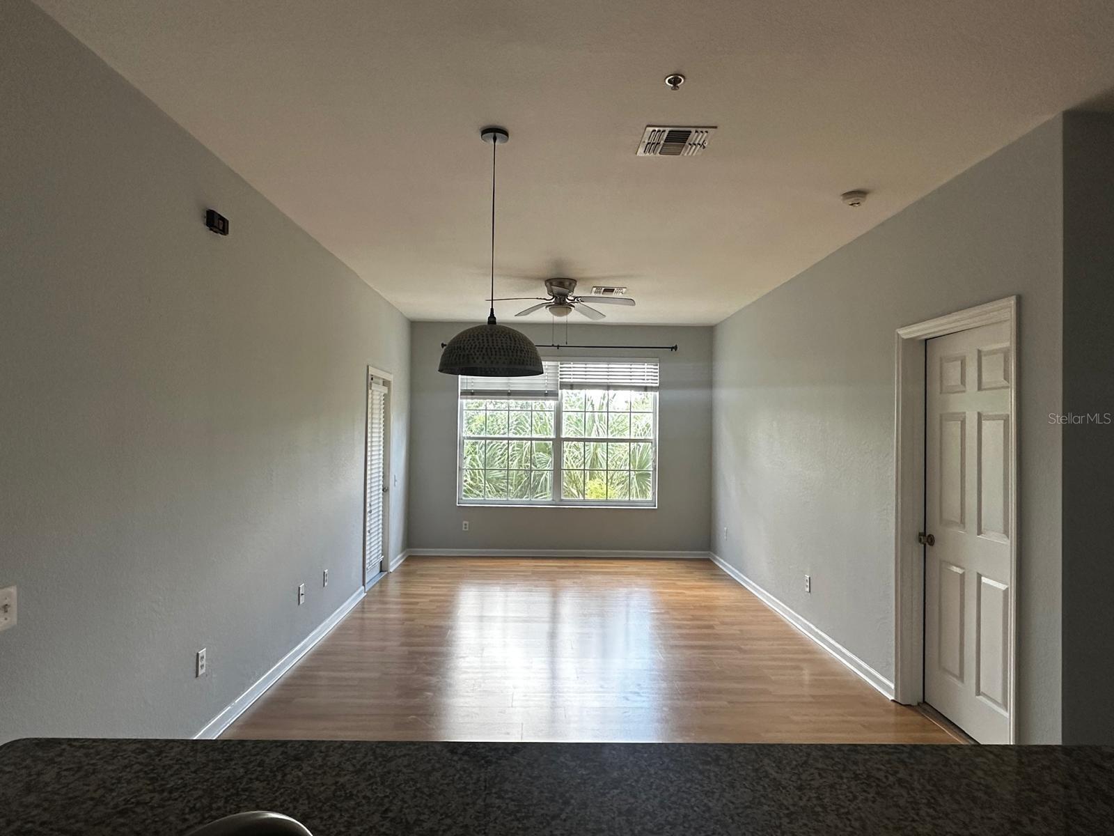 Welcome to this spacious and bright third-floor 3-bedroom, 2-bathroom condo located in the sought-after gated community of Horizons at Stonebridge Place in the convenient Metrowest area. Featuring a split floor plan with abundant natural light, this home offers both comfort and edge. The kitchen boasts elegant dark wood cabinetry, all appliances, durable granite countertops and a functional layout that flows seamlessly into the living and dining areas via a designed pass-through bar area to keep cooking while entertaining.
The family room boasts elegant wood laminate flooring and opens to a screened-in patio through sliding glass doors: an ideal spot to enjoy your morning coffee or unwind after a long day. The owners' king size suite is spacious and filled with natural light, featuring a large walk-in closet with built-in organizers and a private en-suite bathroom. On the opposite side of the living area, you'll find two additional individual bedrooms with their respective closets, sharing a large bathroom. The condo comes complete with washer and dryer, and plenty of additional space for storage or personal furniture and decoration to welcome you home!
The Horizons community offers fantastic amenities, including a resort-style pool, a fitness center, a beautiful clubhouse along with a security gate and many walkways to enjoy the Florida lifestyle and reach potential health goals.
This neighborhood is considered the place to live being centrally located with easy access to I-4, 408 and the Turnpike, major employment and education opportunities like Lockheed Martin, Orange County Convention Center, Mall at Millenia, Sea world, Universal Studios, ICON park (The Eye) and Valencia College, to name a few. For nature calls, Bill Frederick Park at Turkey Lake, the MetroWest Golf Club, Shadow Bay Park and Rose Place Park delivers prime outdoor fun for walking trails, sports facilities, and serene environments just minutes away. Don't miss this opportunity and schedule your visit!