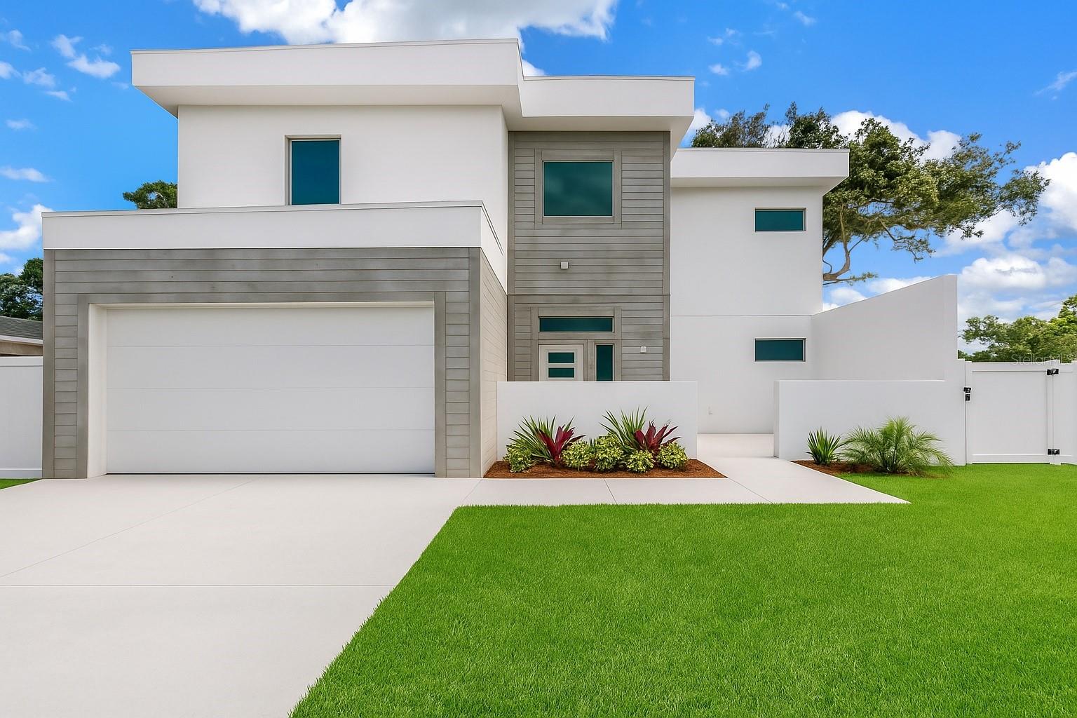 Under Construction. Experience refined coastal living in this newly constructed luxury residence located in the heart of Sarasota. This thoughtfully designed home offers over 3,600 square feet of living space, creating the perfect blend of comfort, privacy, and functionality for family and guests alike. From the moment you enter through the grand courtyard entryway, you are greeted with soaring ceilings and elegant architectural details throughout. The open concept floor plan flows effortlessly through the main living areas, where natural light pours in through oversized sliding glass doors, seamlessly connecting the indoors to the serene outdoor oasis. The gourmet kitchen is the heart of the home, featuring high-end appliances, custom cabinetry, a walk-in pantry, and a generous waterfall quartz center island with seating that borders a formal dining area and an inviting family room that overlooks the resort-style backyard. Step outside to your private fenced-in oasis, where a spa spills into a custom-designed saltwater pool that surrounds a cozy recessed gas fire pit, making it perfect for entertaining year-round. The amazing outdoor space also features a dedicated pool house that includes a half bath and a private outdoor shower, and has an attached outdoor kitchen with a built-in grill, sink, refrigerator, and bartop seating. Each of the six spacious bedrooms has been carefully planned for relaxation and style, equipped with a private en suite bathroom and a custom walk-in closet. Additional highlights include a second-floor rear lanai balcony, a full-size laundry room with a utility sink, and a two-car garage with ample storage. What's more, the home is located in one of Sarasota’s most desirable residential areas, allowing short-term weekly rentals and offering a rare combination of elegance, comfort, and convenience just minutes from world-class beaches, vibrant downtown Sarasota, fine dining, and shopping. *Interior images are of a similar model home for illustrative purposes only. Actual finishes and features of the property may vary upon completion.*